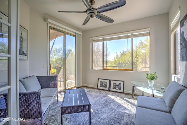 sunroom featuring plenty of natural light and ceiling fan