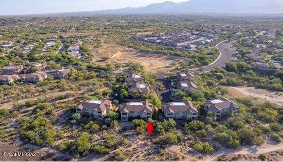 aerial view featuring a mountain view and a residential view