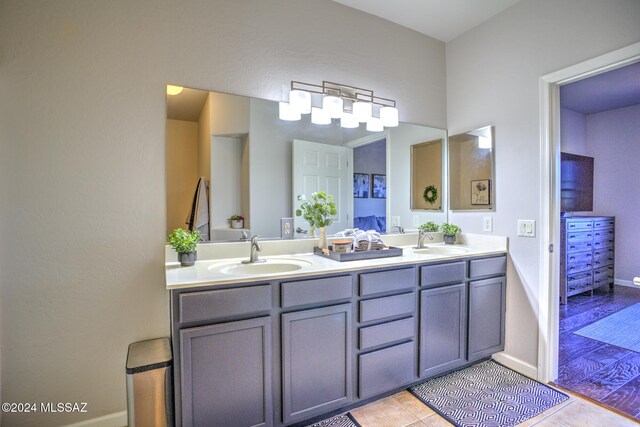 bathroom with vanity and tile patterned floors