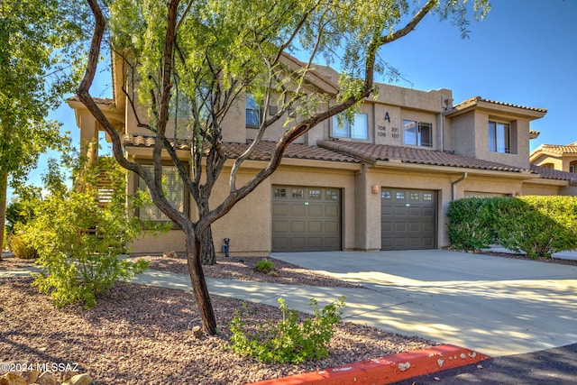 view of front of property featuring a garage