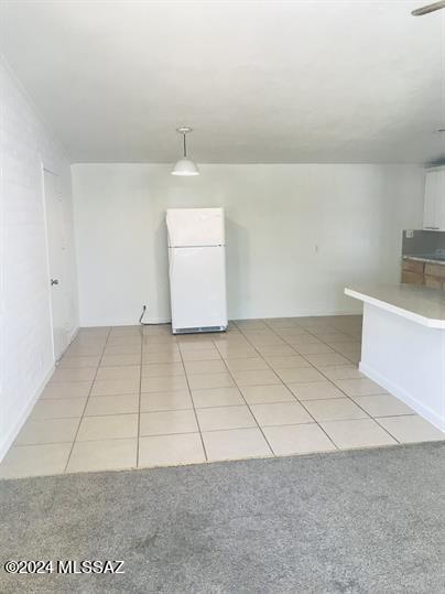 view of tiled spare room