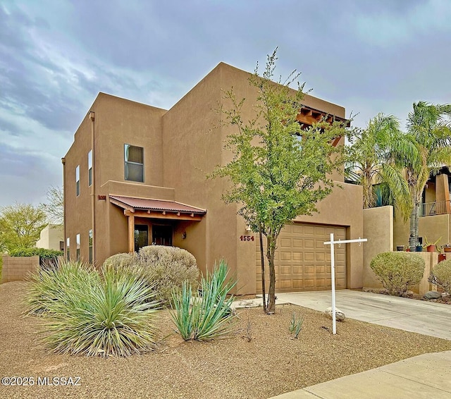 adobe home with a garage