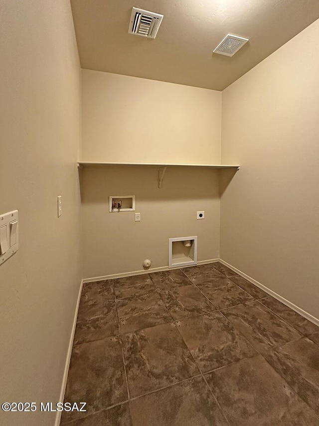 clothes washing area featuring hookup for a washing machine, hookup for a gas dryer, and electric dryer hookup