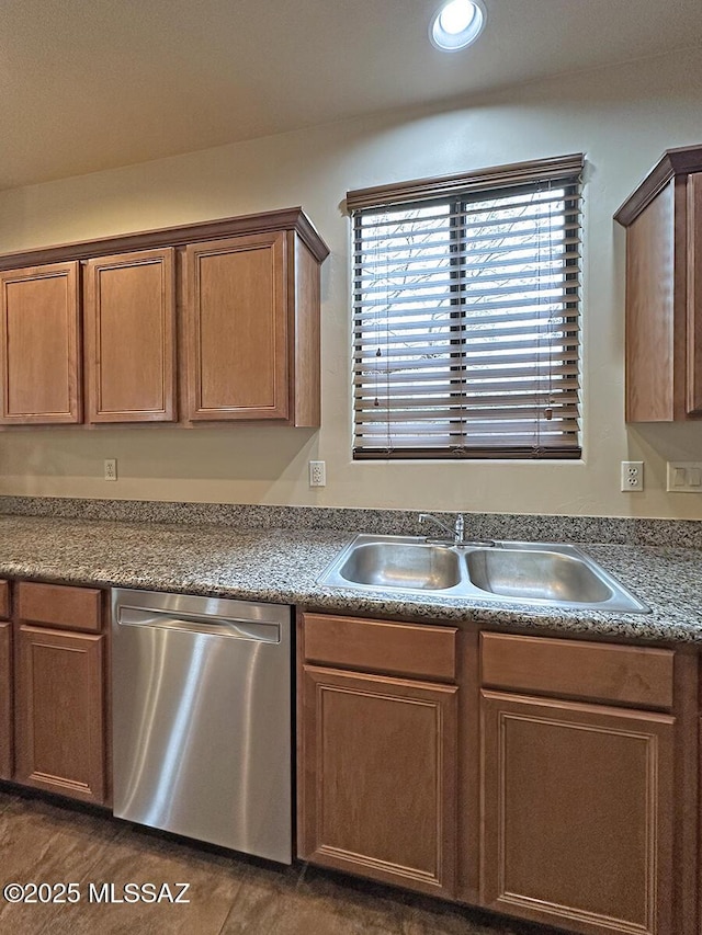 kitchen with sink and stainless steel dishwasher