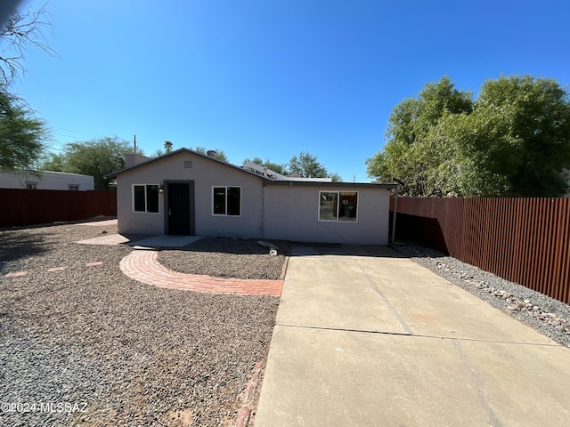 single story home featuring a patio area