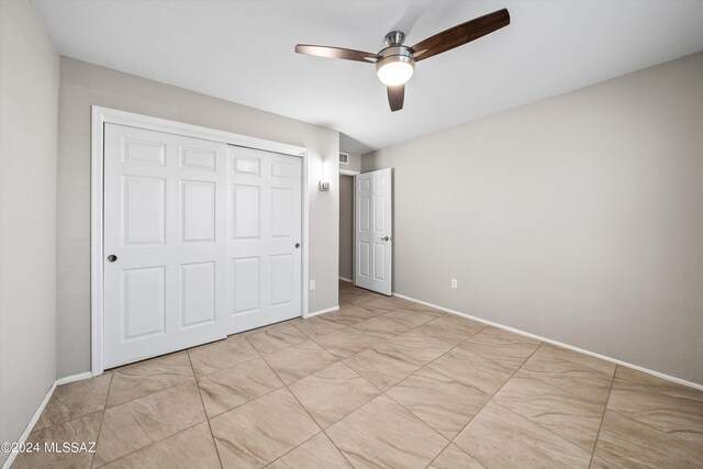 spare room featuring ceiling fan