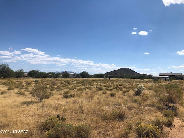 view of mountain feature with a rural view