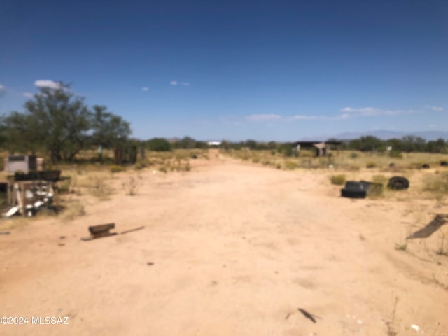 exterior space with a rural view