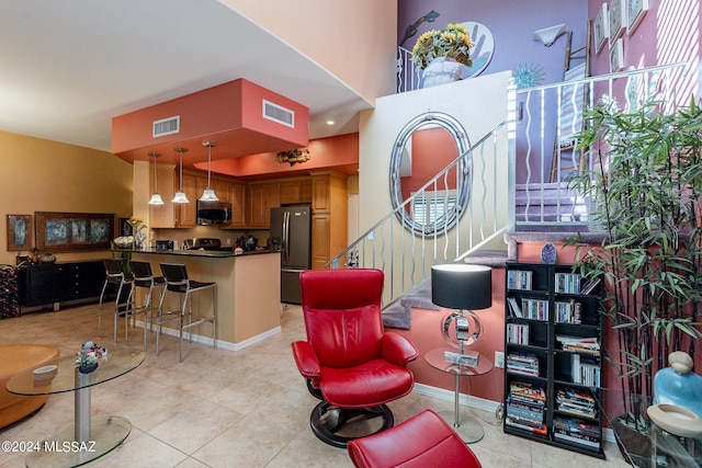 living room featuring light tile patterned floors