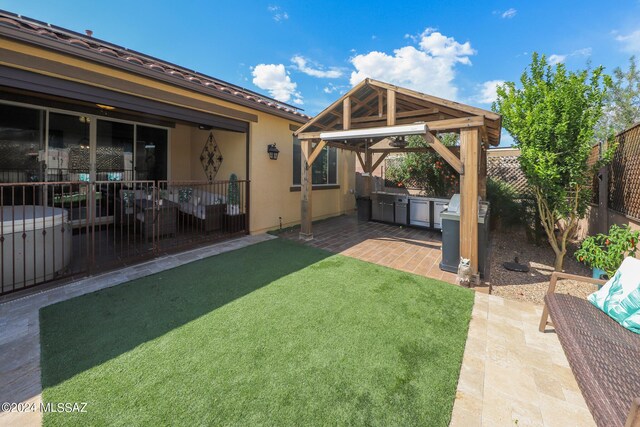9745 S Desert Flint Dr, Tucson, AZ 85747 - view of yard with a gazebo, a fenced backyard, a patio, and area for grilling