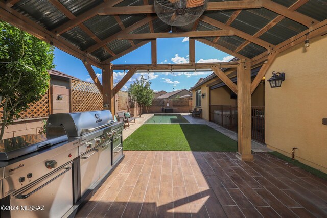 9745 S Desert Flint Dr, Tucson, AZ 85747 - view of patio / terrace with grilling area, a fenced backyard, a gazebo, and area for grilling