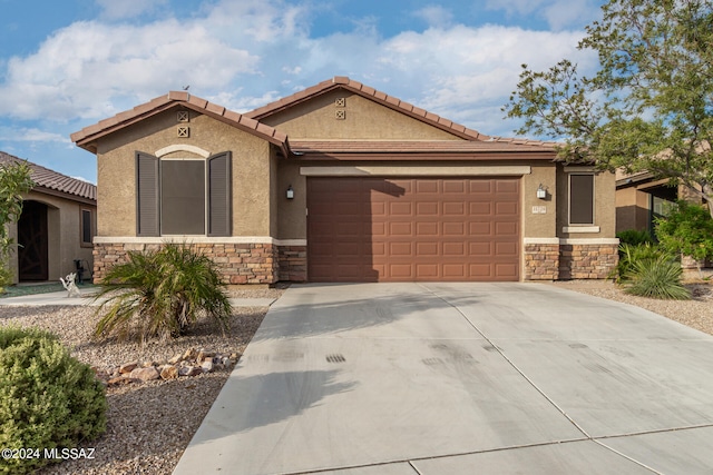 view of front of home featuring a garage