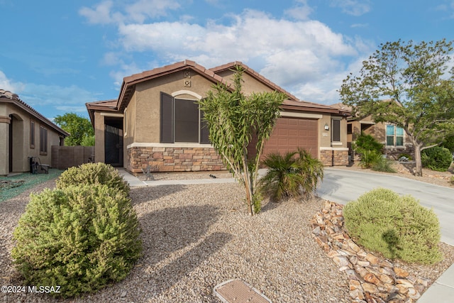 view of front of home featuring a garage