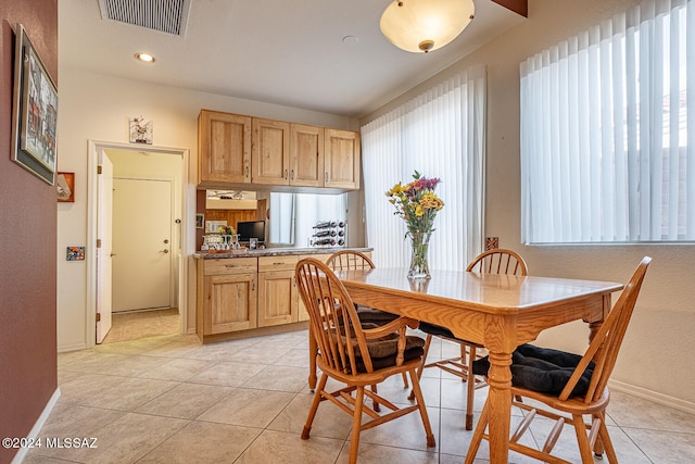 view of tiled dining space