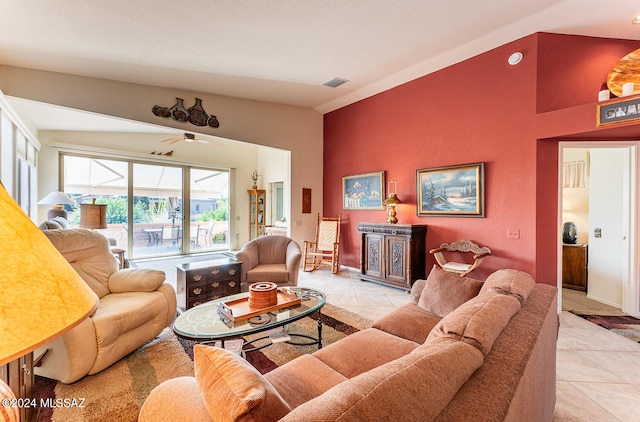 tiled living room with lofted ceiling