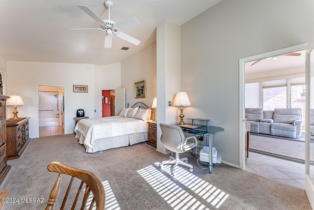 bedroom featuring ceiling fan and light colored carpet