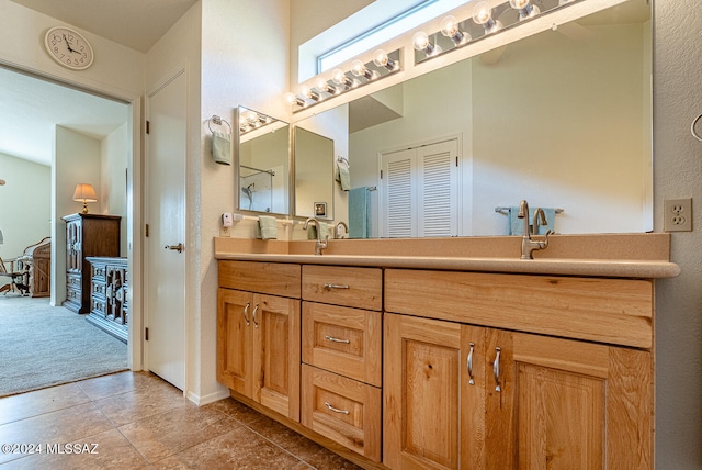 bathroom with vanity and tile patterned floors