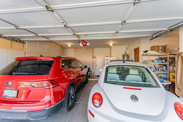 garage featuring a garage door opener