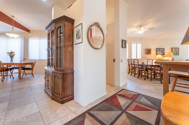 hallway with light tile patterned floors