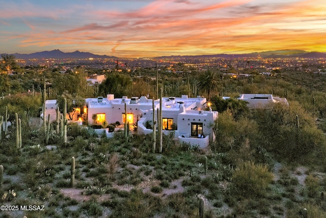 aerial view at dusk with a mountain view