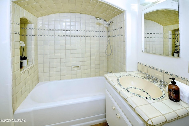 bathroom with shower / tub combination and vanity