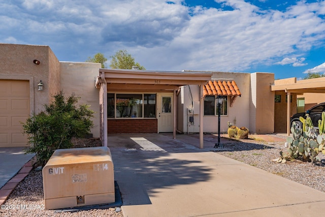 view of front of property with a garage