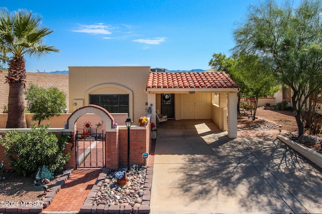 view of front of property with a carport