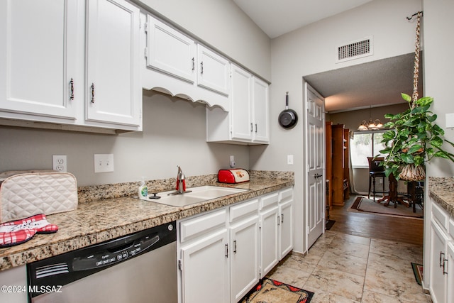 kitchen with dishwasher, light hardwood / wood-style floors, sink, white cabinetry, and an inviting chandelier