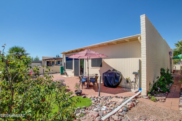 rear view of house with a patio area