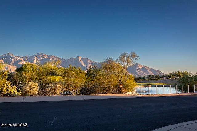 mountain view featuring a water view