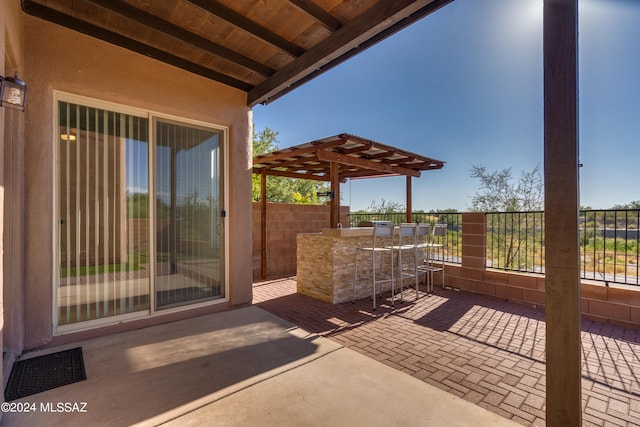 view of patio / terrace featuring a pergola