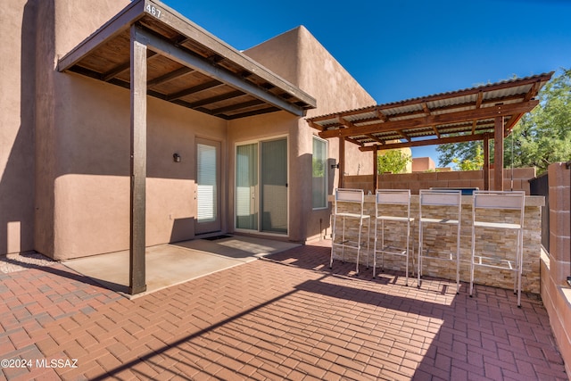 view of patio featuring a pergola