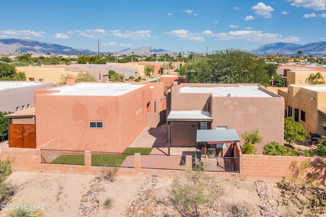 birds eye view of property with a mountain view