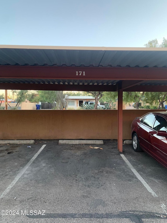 view of parking with a carport