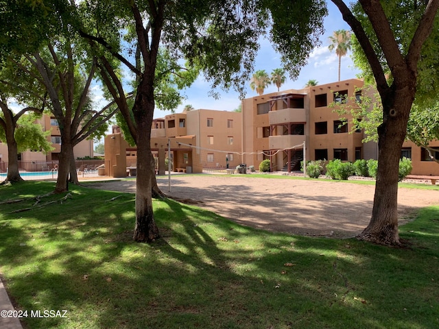 view of property with a community pool