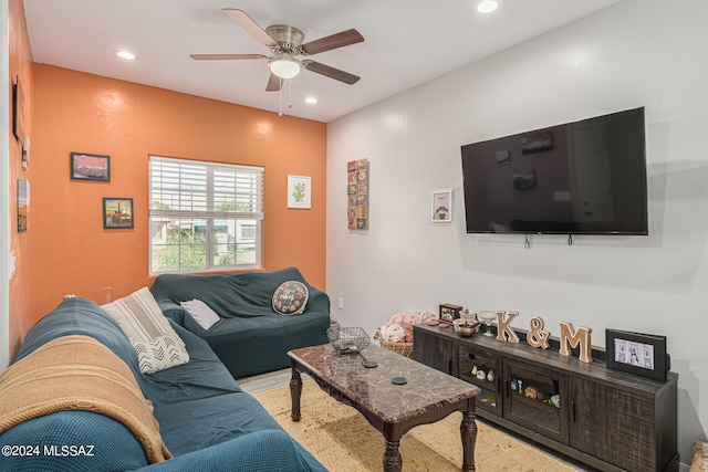 living room featuring ceiling fan