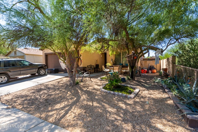 view of front of home featuring a patio