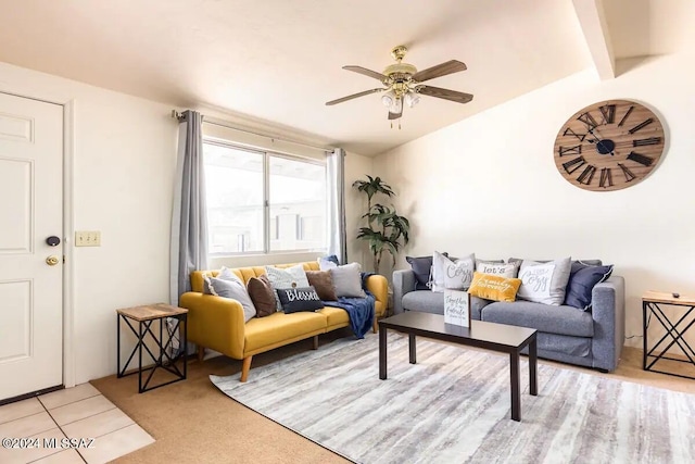 living room with ceiling fan, light colored carpet, and vaulted ceiling with beams