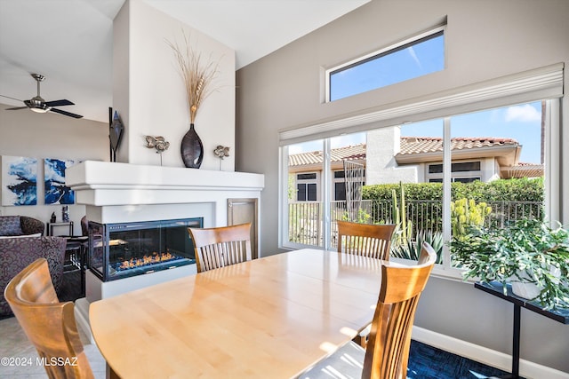 dining area with ceiling fan and plenty of natural light