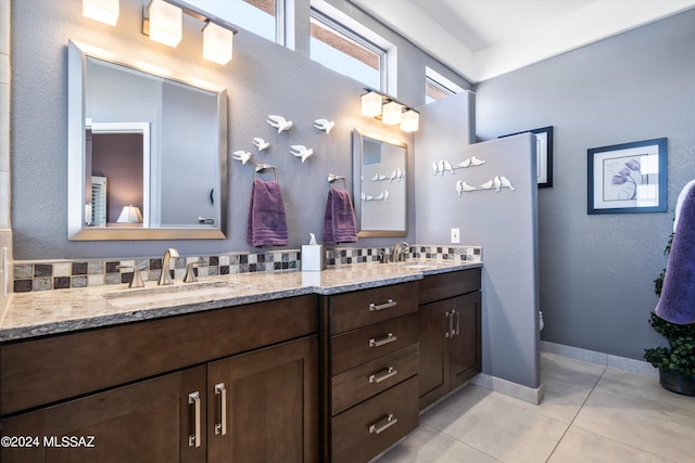 bathroom with vanity and tile patterned floors