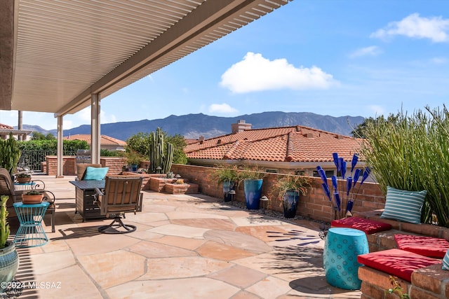 view of patio featuring a mountain view