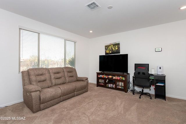 living room featuring light carpet