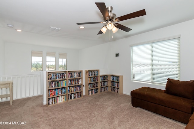 sitting room with light colored carpet