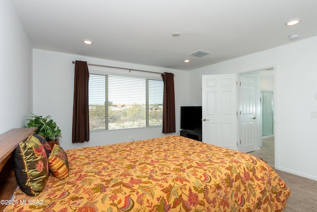 bedroom featuring carpet