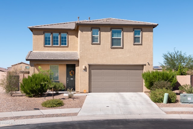 view of front of home featuring a garage