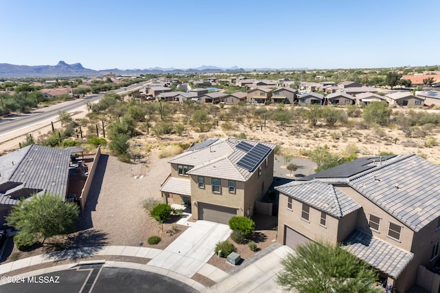 drone / aerial view featuring a mountain view