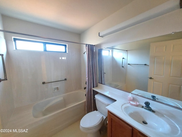 full bathroom featuring shower / tub combo with curtain, vanity, and toilet