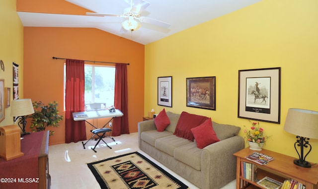 living room featuring ceiling fan and lofted ceiling