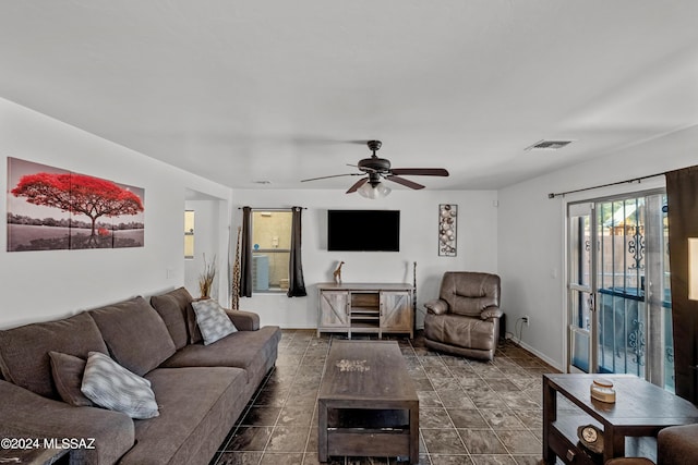 398 W Cedar Chase Dr, Green Valley, AZ 85614 - living area with a ceiling fan and visible vents