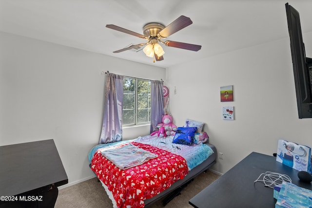 398 W Cedar Chase Dr, Green Valley, AZ 85614 - carpeted bedroom with ceiling fan and baseboards